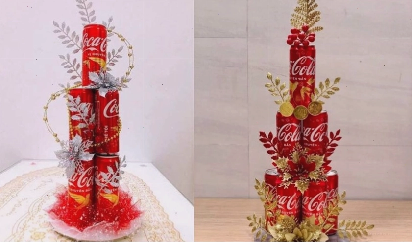 Xếp 5 lon nước ngọt Coca Cola tạo thành tầng đáy